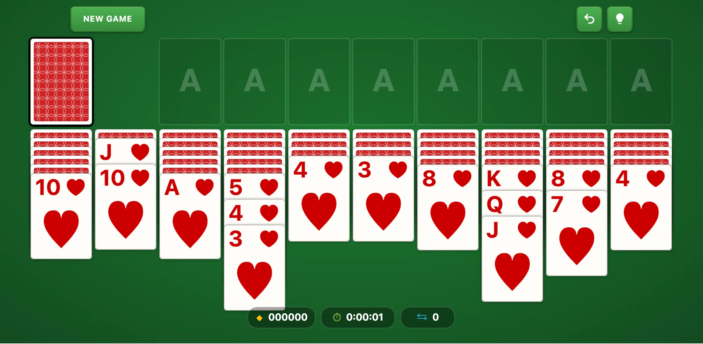 Spider Solitaire mid-game showing cards being moved and face-down cards being uncovered